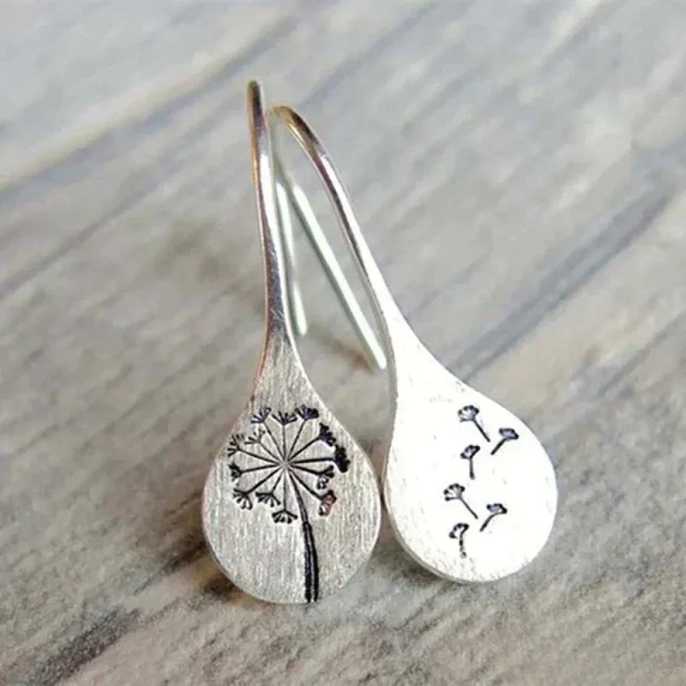 Elegante zilveren oorbellen in Dandelion-bladontwerp
